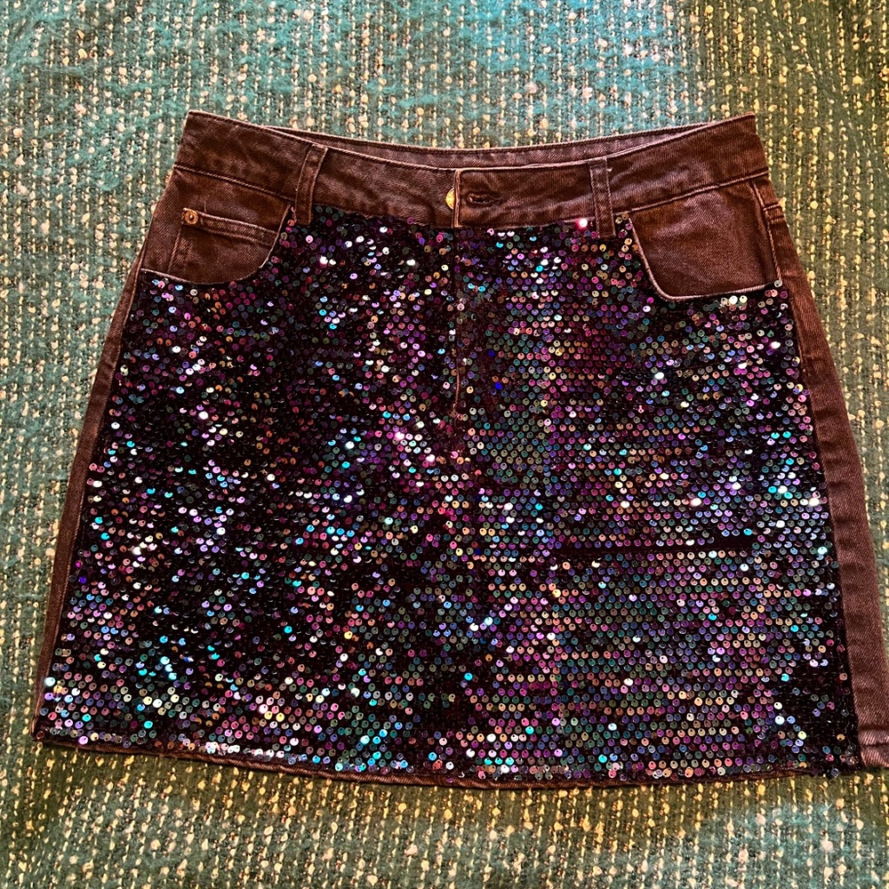 TOPSHOP sequence black mini skirt.